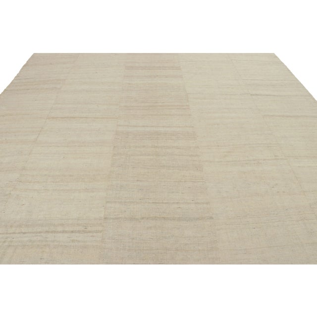 Handwoven in wool, this 11x14 vintage Persian kilim is the latest addition to Rug & Kilim’s coveted Kilim & Flatweave...