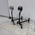 Beautiful hand crafted wrought iron andirons, good look and size to them. Just needs a cozy fireplace and some logs