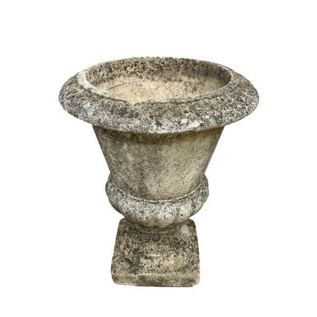 This pair of antique planters circa 1920 France by the famous foundry, Brandon Freres are in the Neoclassical style with a...