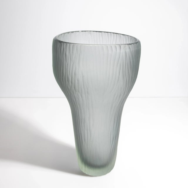 This is a truly remarkable piece, distinguished by its exquisite design and subtle color. The smoky gray hue adds a...
