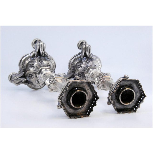 Silver Candlesticks with Applications, in Very Good conditions. Designed 1890 to 1919 This piece has an attribution mark,...