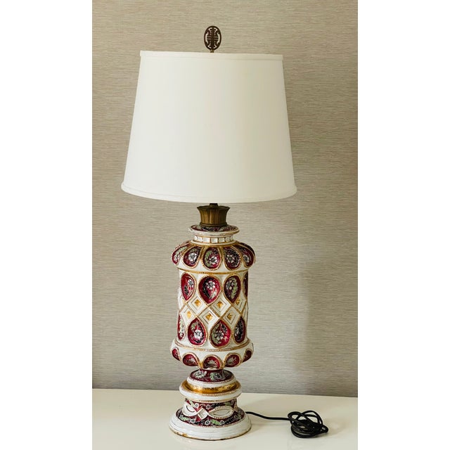 Famous Ulissi Cantagalli Italian majolica lamp, Handpainted in florals, scrolls and Ashanti’s leaves and gold decor. Was...