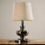 Table lamp from the 1970s with a reflective chrome plated body and a new textile lampshade. with some surface scratches,...