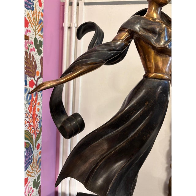 Art Deco bronze figure dancer Bronze, partly dark patina standing on an iron base Artist unknown
