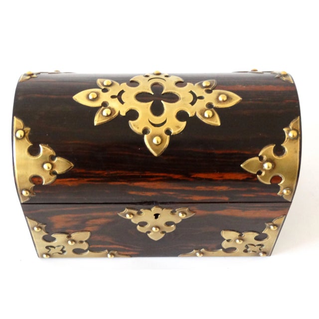 Fine quality antique handcrafted domed box with lock and key. This lovely English box is Gothic in style and made with...