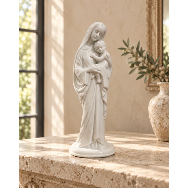 A graceful mid-20th-century Madonna and Child figurine by the noted German art-porcelain manufacturer Metzler & Ortloff....