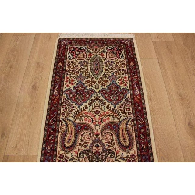 • Middle Eastern rug "Saroug" | Knot density: High, traditional | Material: High-quality wool | Size: 134×69 cm | Pattern:...