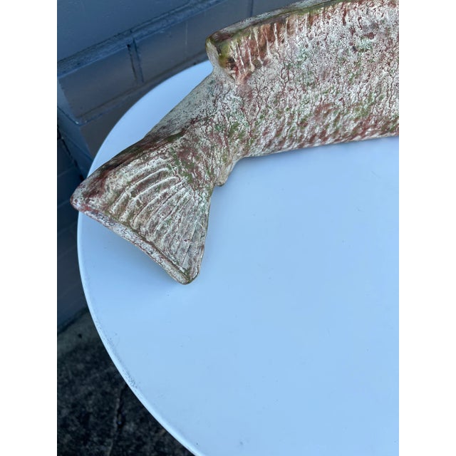 Fish life like Sculpture in a neutral color great decorative piece for the Aquatic lovers . Made of ceramic Pottery .