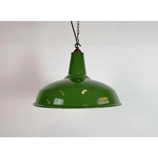 Industrial green enamel factory pendant light made by Jackson Electric Co. Chicago, Illinois in United States during the...