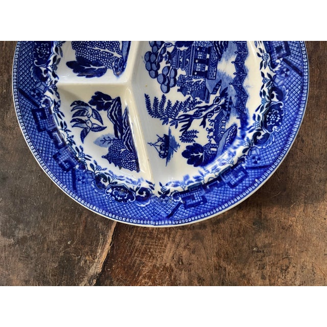Stunning set of three plates, made in Japan, each depicting, the classic and traditional pattern of blue willow. These...