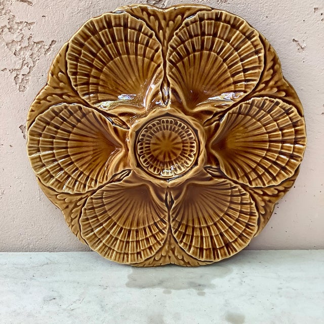 Majolica oyster plate signed Sarreguemines, circa 1950. 6 plates are available.