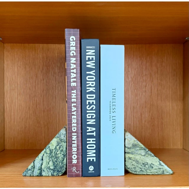 We are very pleased to offer a sculptural pair of bookends crafted from distinctive Connemara marble, the uncommon green...