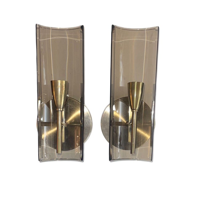A stylish and elegant pair of vintage Italian wall sconces designed by Cristal Arte, circa 1960's. These refined Mid-...