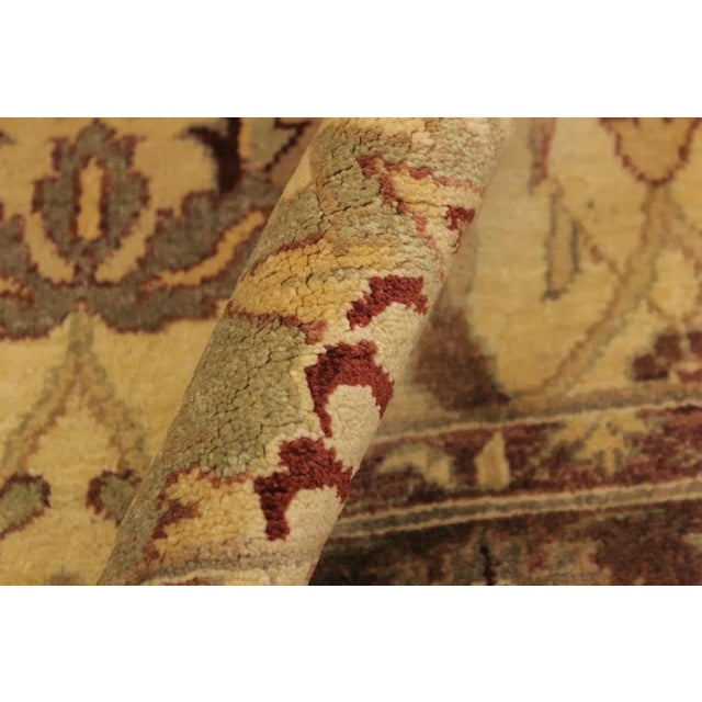 This gorgeous transitional handmade rug follows an abstract pattern which exotically repeat like a continuous reflection....