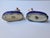 Quality pair of antique Staffordshire sheep ink wells. They feature a classic confetti glaze and lay on a blue and gold base.