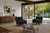 Mid-century modern walnut lounge chairs, crafted in the United States circa 1950s, and strongly reminiscent of the designs...