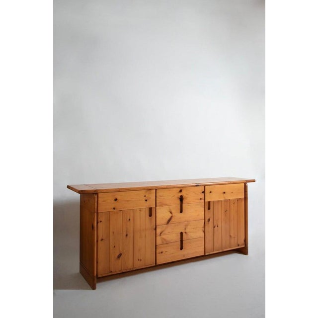 Pine sideboard, 1970s. Height: 85 cm - 33.46 in Length: 207 cm - 81.5 in Width: 45 cm - 17.72 in