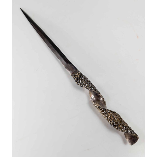 We are selling this exceptional and cool Sterling Silver letter opener. This letter opener has great Mid-Century Modernist...