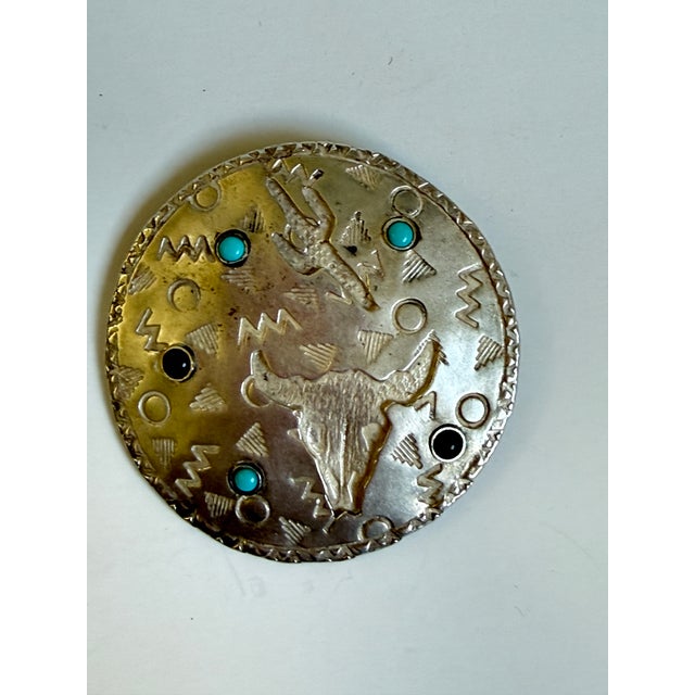 A stunning, authentic Native American sterling silver brooch/pin handcrafted by the highly collectible Navajo silversmith,...