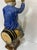 Polychrome earthenware fountain Decorated with a man seated on a barrel Wear and losses, see photos H 54 x W 23 x D 22 cm...