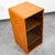 Compact lighted teak and glass cabinet. Made in Denmark. There is a light behind each shelf. Unsigned example.