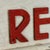 Vintage Art Deco Period Wood "For Rent" Sign in Bright Red Lettering and Design Motif For Sale - Image 4 of 8