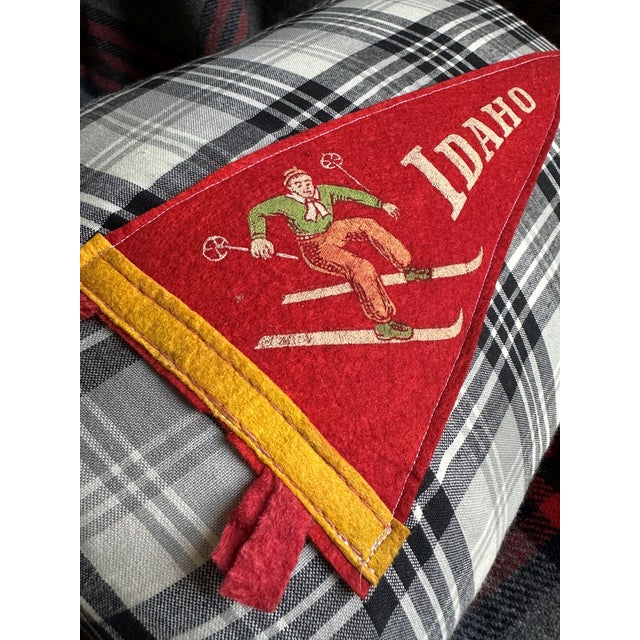 Description: Vintage Idaho ski Felt Pennant from around the 1950s or 1960s, unknown date. New black and white plaid woven...