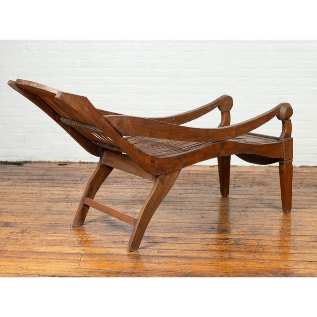 Brown Antique Indonesian Reclining Plantation Chair with Bamboo Slats and Carved Décor For Sale - Image 8 of 10