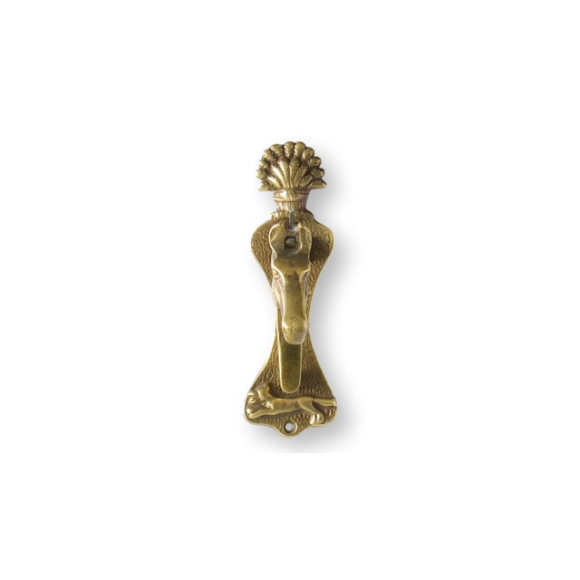 Antique English brass horse-form doorknocker, circa 1880, featuring an unusually streamlined, sculptural profile. The...
