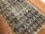 A striking example of mid-century textile design, this vintage Isparta rug brings bold geometry and a refined color...