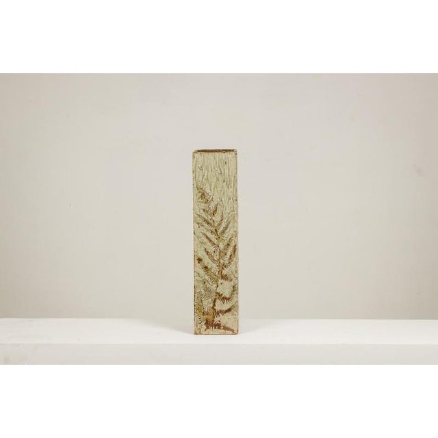 Brutalist-style vase with a square cross-section, made of scarified and glazed stoneware, with plant decoration. Work...
