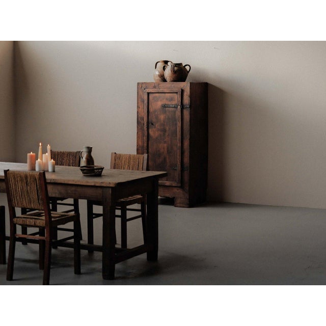 Alpine pine wardrobe from piedmont, an 18th-century example of mountain folk art and craftsmanship. The piece is...