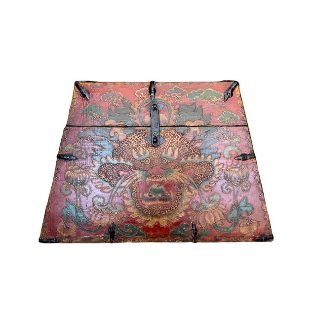 Antique Chinese hand decorated trapezoid shaped "Dragon Box' with original iron fittings. Late Qing Dynasty. The...