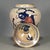 This lovely lidded ginger jar features a classic crackle glaze cream body adorned with a hand-painted koi carp design in...