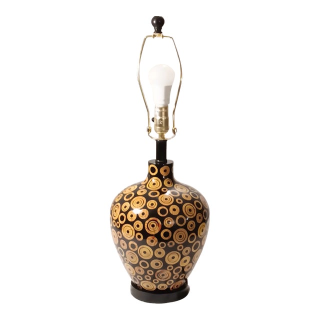 Vintage Mid-Century Modern Wood Lamp With Black Base Color and Embellished With Light Tan Circles With a Touch of Red Grain Lines For Sale