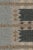 Hand-knotted in wool, this 10x11 Scandinavian rug features repeating geometric motifs in muted blue, taupe, and ivory....