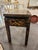 This is a mid 20th century Trouvailles low alter table. It is hand painted parcel gilt with a dragon motif. It is...