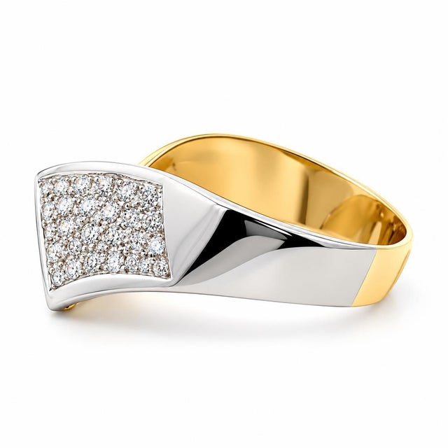 An authentic and substantial fine jewelry statement ring crafted in solid 18k two-tone yellow and white gold. Featuring a...