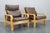 - Good original condition with minor signs of use - Patinated leather - The lower armchair dimensions are: Height :80cm,...