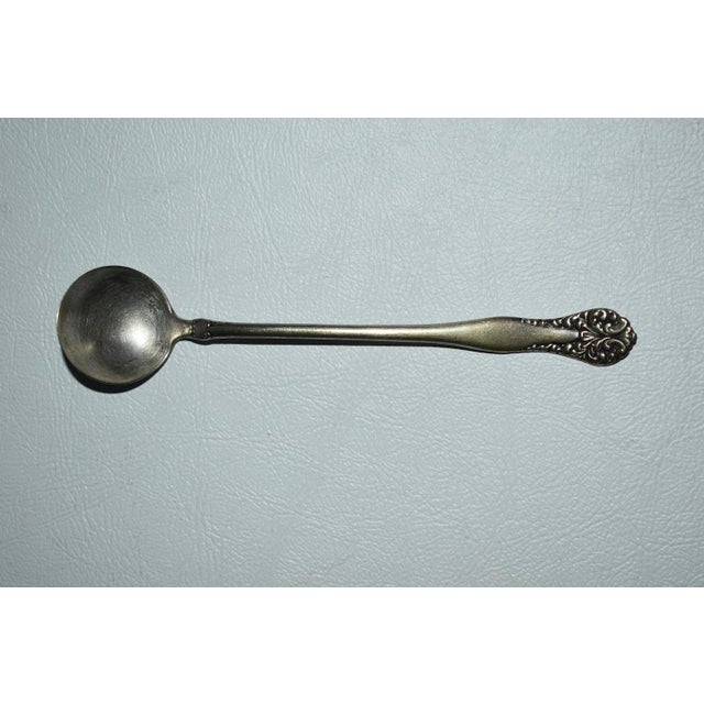 Antique (1920's) Ladle/Serving Spoon is English and Hallmarked. Silver color. The Measurements: 5"W x .5"D x .5"H. Free...