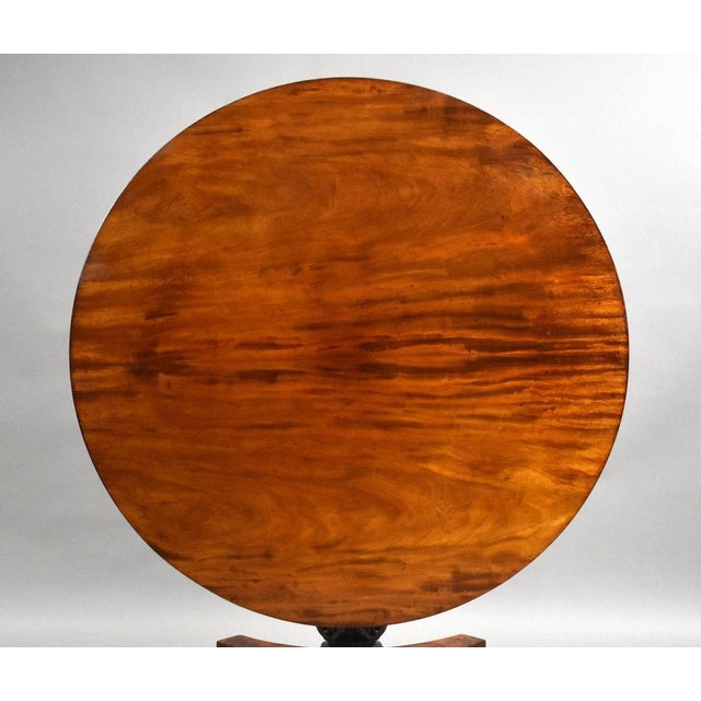 Victorian circular mahogany breakfast table, dating to the mid–late 19th century, offering elegant proportions and rich...