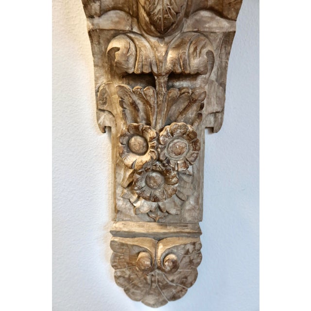 An authentic Restoration Hardware carved wood wall corbel in the Spanish Revival style, featuring rich Baroque...