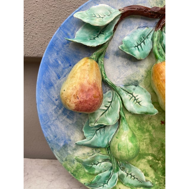 Colorful 19th century French Majolica pears wall platter signed Longchamp terre de fer. The fruits are in high relief with...