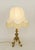 Vintage Table Lamp Floor lamp made around 1920. Brass with four curved legs and a tall column. Newly made fabric shade...