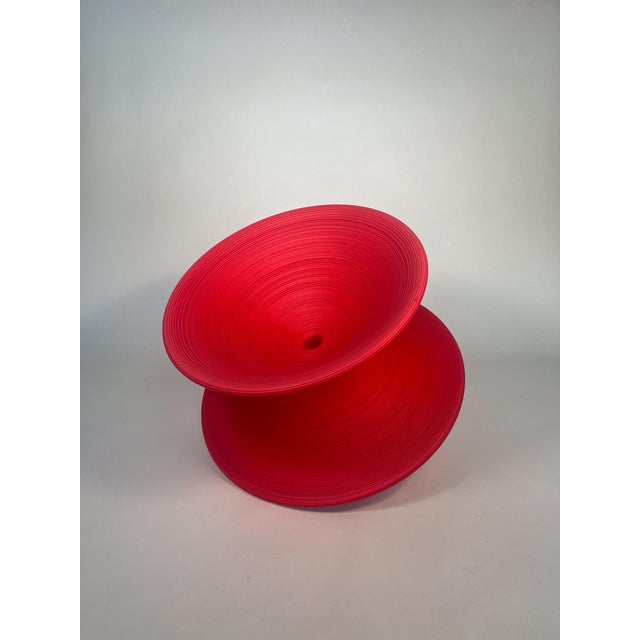 Description: Playful, sculptural, and instantly recognizable — the Spun Chair by Thomas Heatherwick for Magis blurs the...