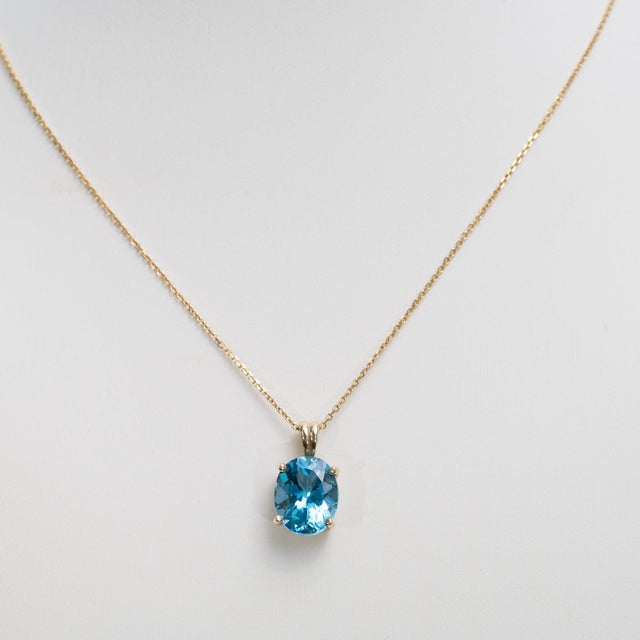 1.1Ct Natural Swiss Blue Topaz Pendant in Solid 14k Gold – Oval, 11x9mm For Sale - Image 4 of 7