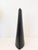 A sculptural matte black ceramic vase by Evangeline Pottery of Quebec, Canada. Tall slab form with curved front profile...