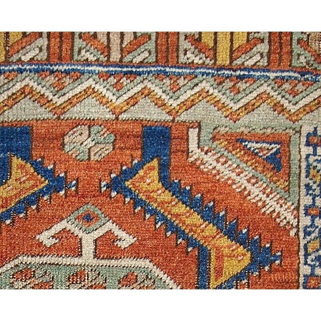 Antique collectible Turkish Yastik rug in bright orange, yellow and blue shades. The centre and two ends are in light...