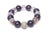 This jeweler custom made stretch bracelet has both light and dark purple stones and silver balls. It has never been worn....