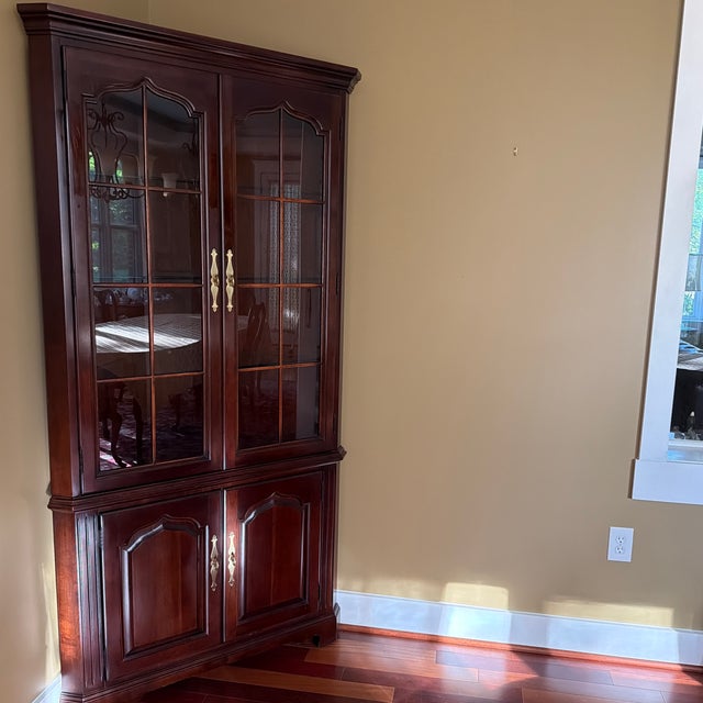 Vintage (early 1990’s) Thomasville Collector's Cherry display china cabinet with storage below. Will hold a complete china...